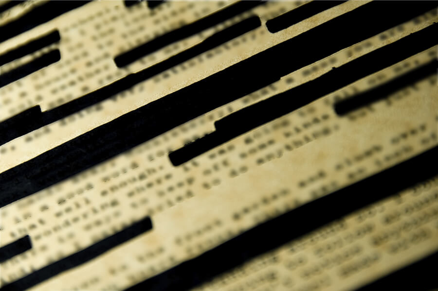 Image of a page with redacted text Image of a page with redacted text